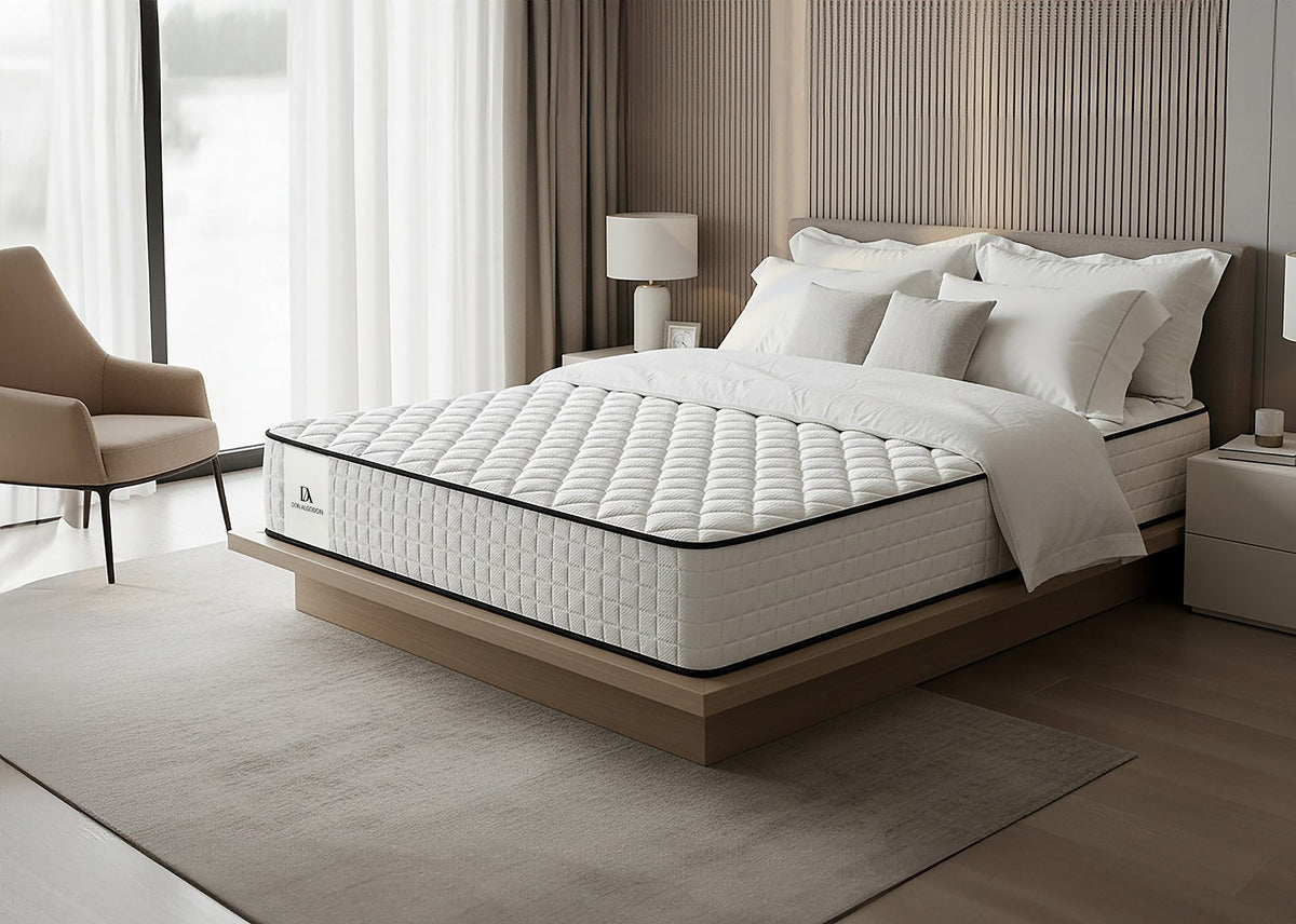 Colchón Deluxe Confort Don Algodón – en un dormitorio con butaca